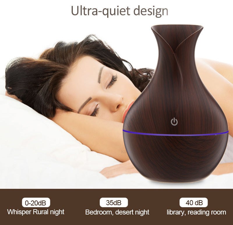 Vase-shaped portable humidifier with 130ml tank and quiet mist output