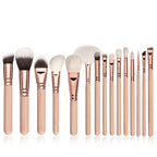 15-piece makeup brush set with nylon bristles and wooden handles in rose gold style