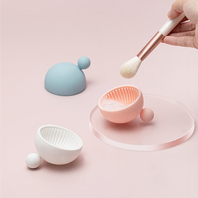 Silicone small ball makeup brush cleaning pad in white, pink, and blue