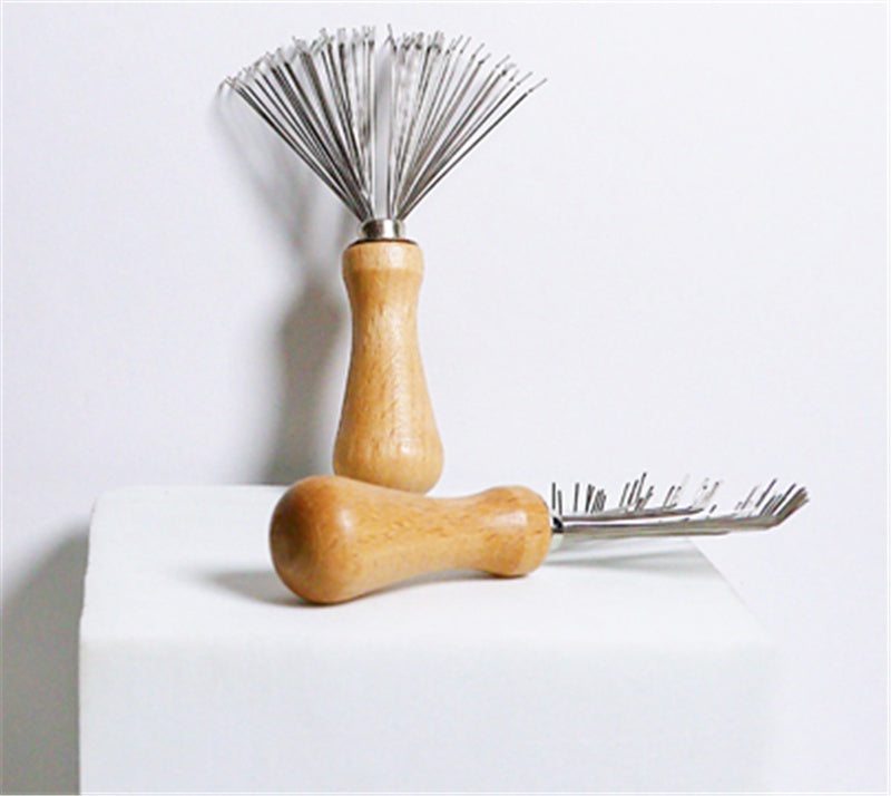 Small air cushion comb cleaning brush for removing hair from hairbrushes