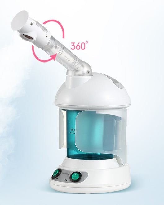 White portable facial steamer with rotating ion spray for home skincare