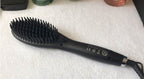Ceramic hair straightening brush with anti-frizz and detangling features