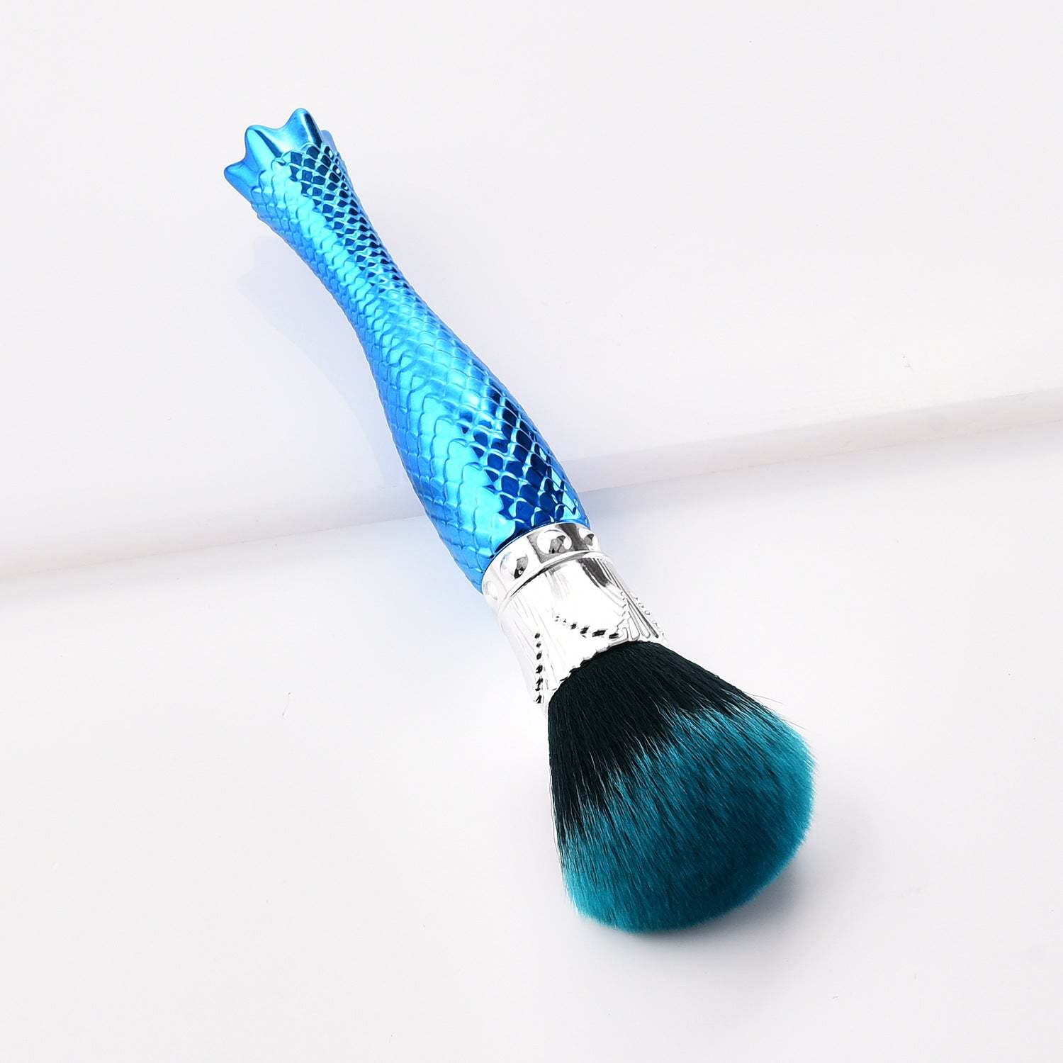 Blue single makeup brush with nylon bristles and a portable plastic handle