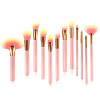 Pink 12-piece makeup brush set with nylon bristles and wooden handles
