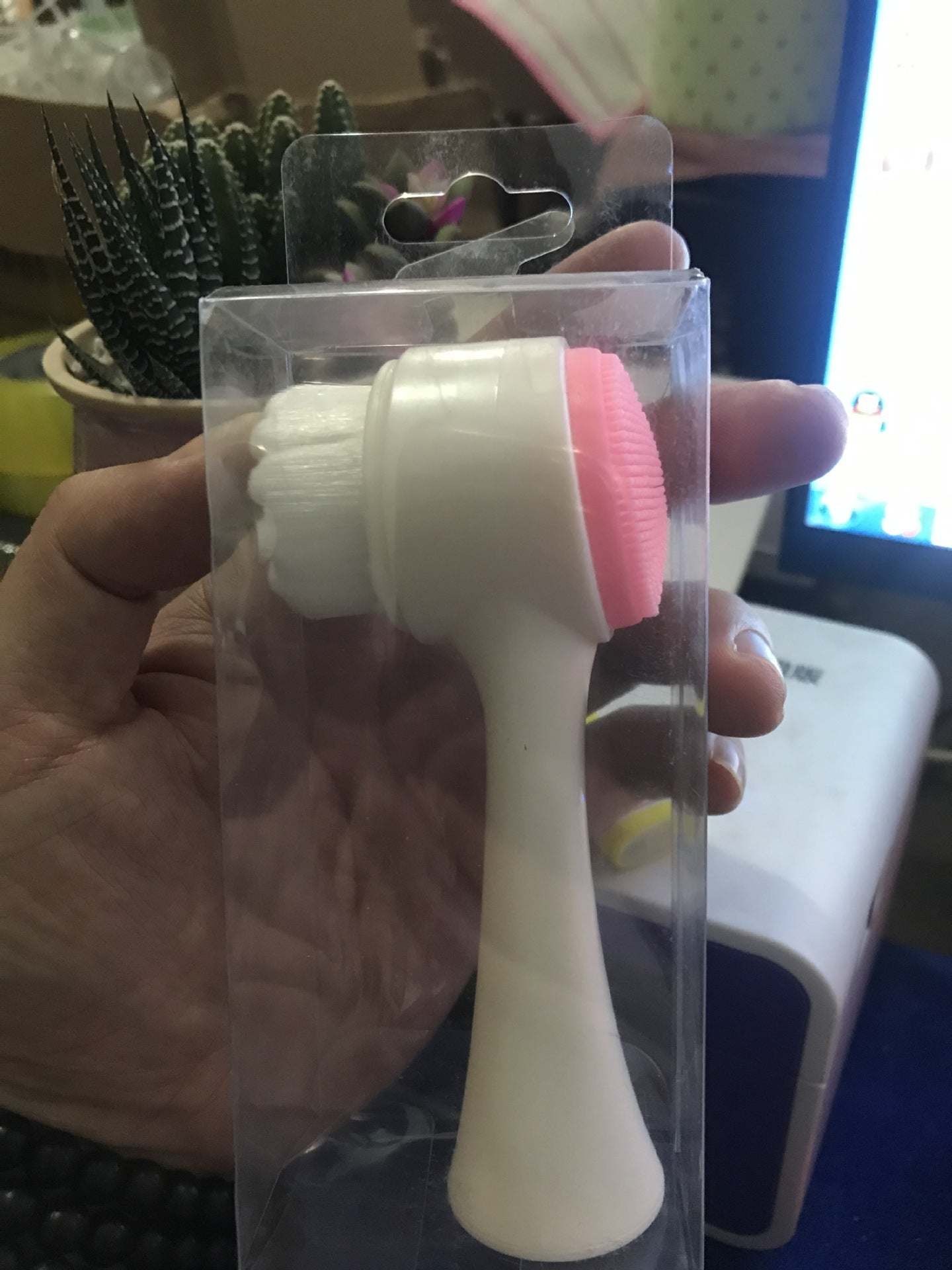 Soft bristle facial cleansing brush with PBT fibers and ABS handle