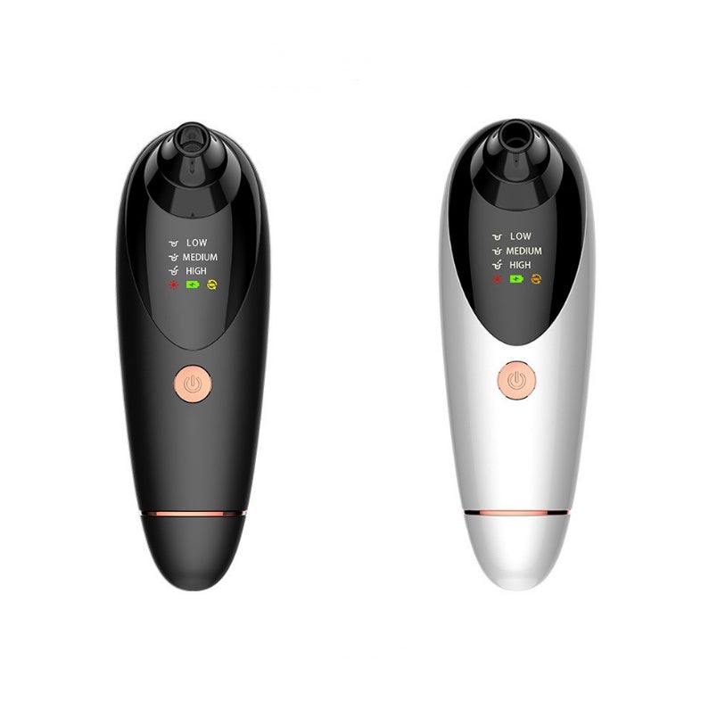 Portable black and white beauty instrument with heat, vibration, and suction