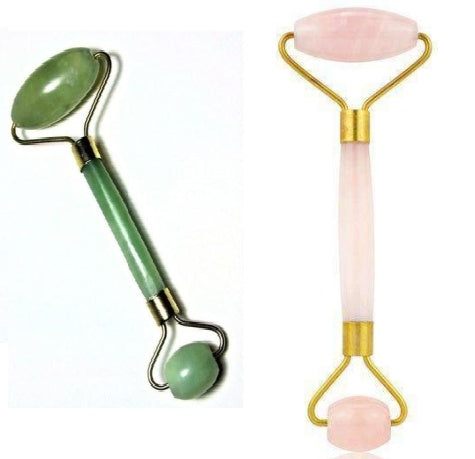 Green and pink jade facial massage roller made from natural stone