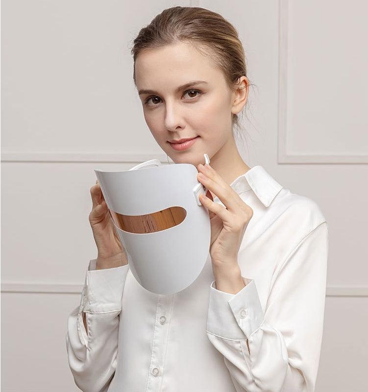 LED acne beauty mask with red, blue, and orange light therapy settings