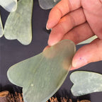 Natural jade Gua Sha scraping tool with smooth curved edges