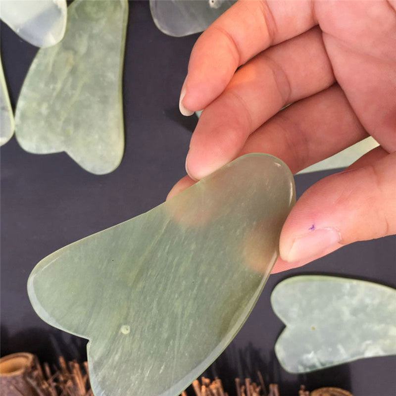 Natural jade Gua Sha scraping tool with smooth curved edges