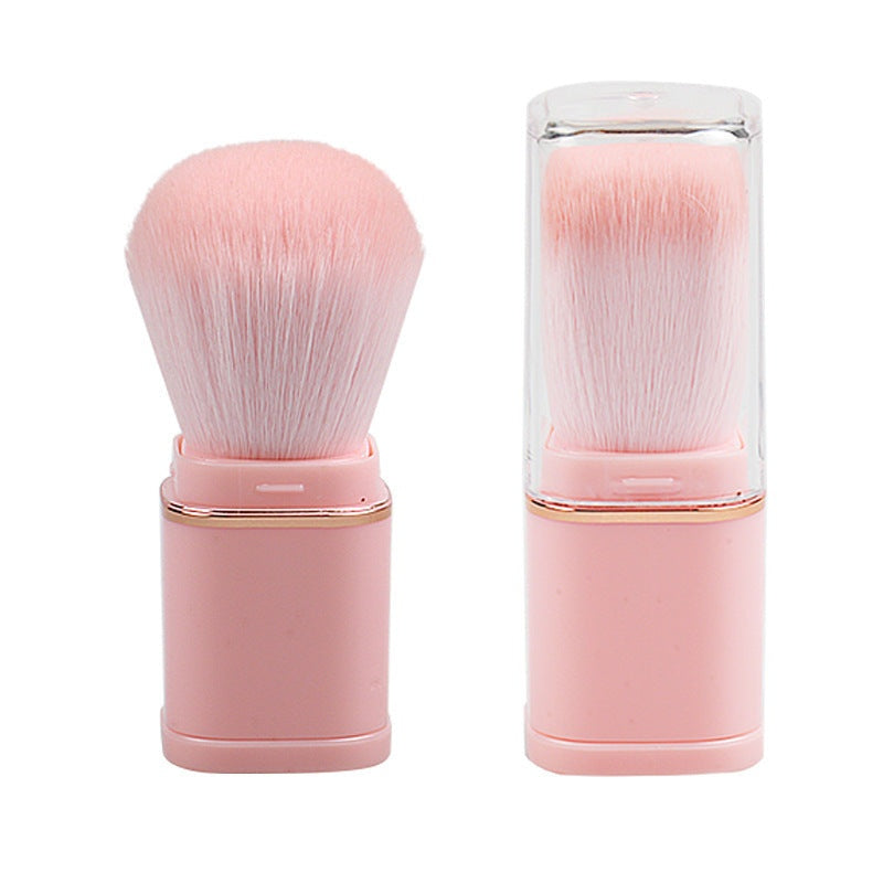 Portable retractable powder brush with soft artificial fiber bristles