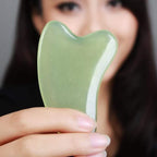 Natural jade Gua Sha scraping tool with smooth curved edges