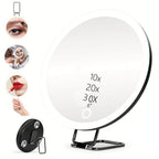 USB rechargeable LED makeup mirror with rotating stand, tweezers, and scissors