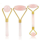 Green and pink jade facial massage roller made from natural stone