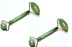 Green and pink jade facial massage roller made from natural stone