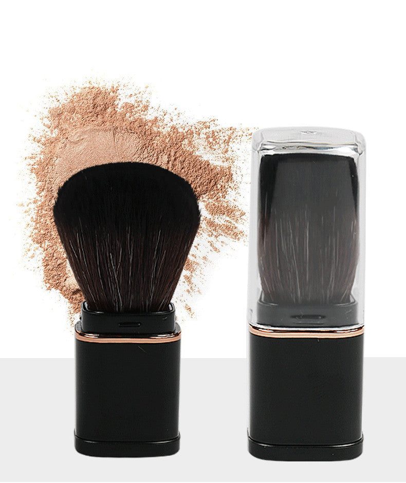 Portable retractable powder brush with soft artificial fiber bristles