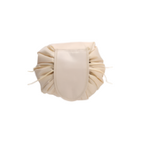Beige drawstring pouch on a white background