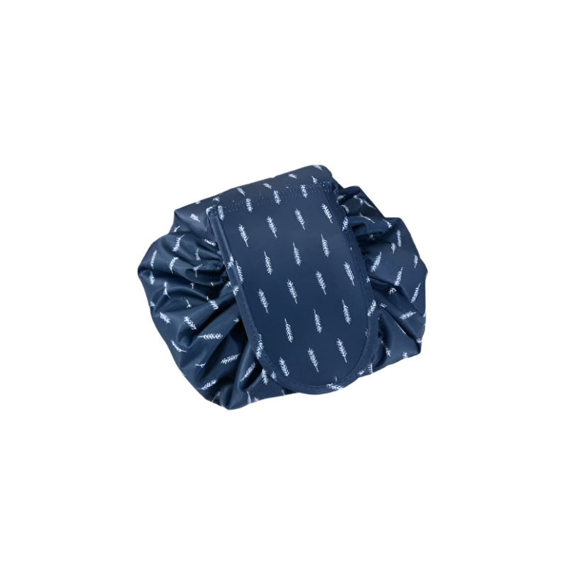 Blue scrunchie with white pattern on a light gray background