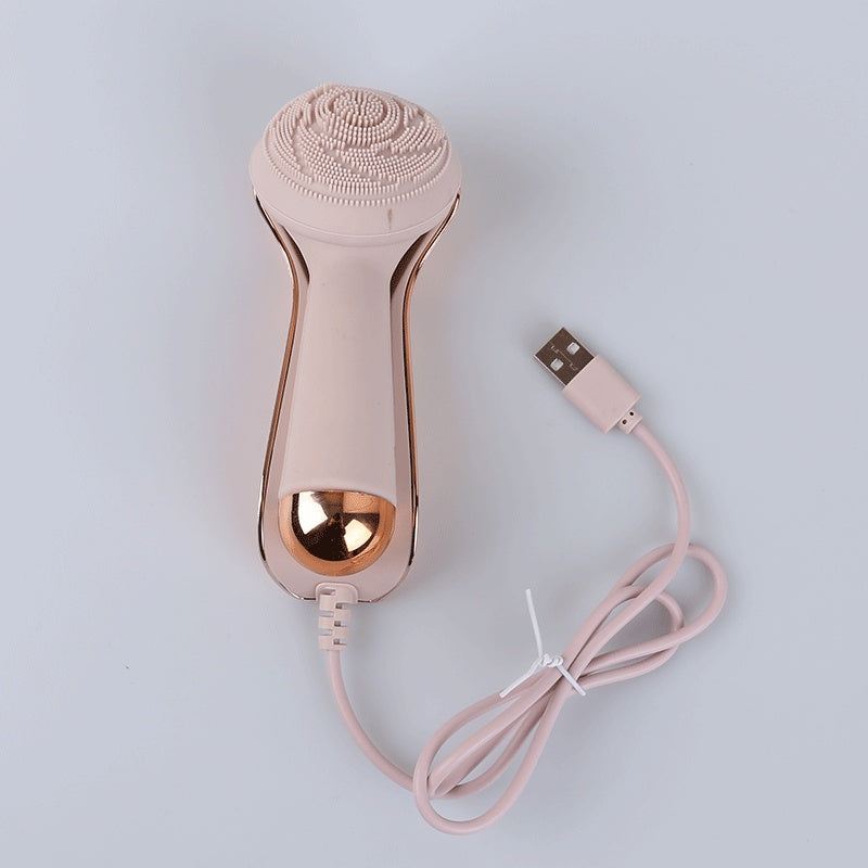 Electric silicone face cleansing brush with rotating cleaning head